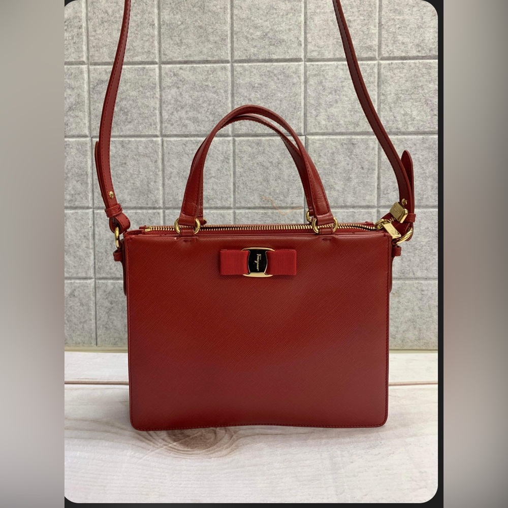 Salvatore Ferragamo Vara Bow Saffiano Leather 2 way bag with Gold tone hardware.